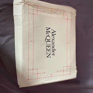 Alexander McQueen size 11 us size 44 euro slightly used. Near mint condition.